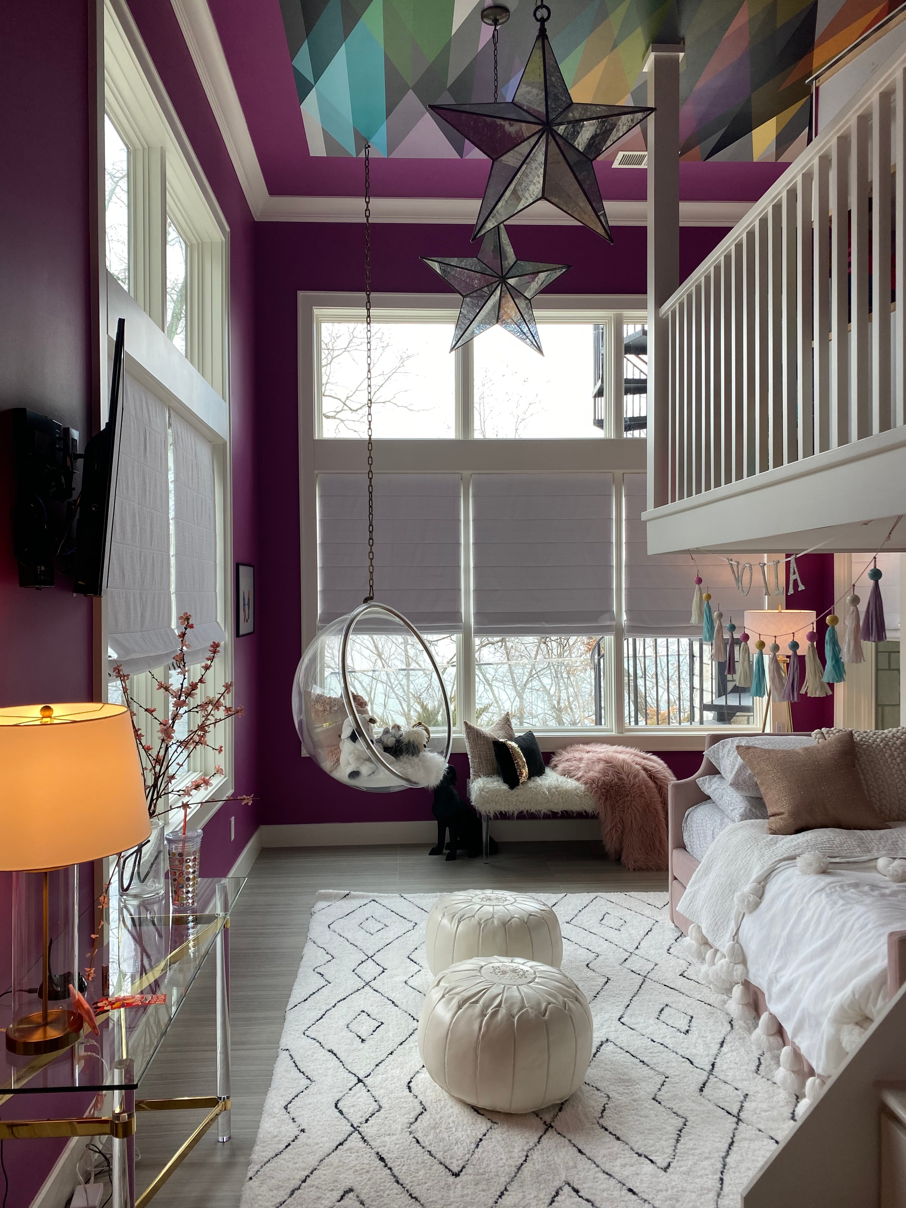 Whimsical Paris mural room with crystal chandelier